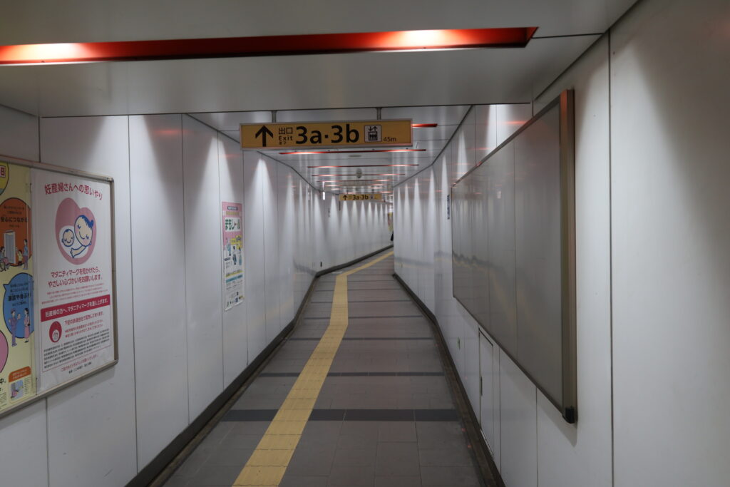Walk down the hallway until you see an escalator on your right.